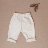 Look calças baunilha c/ body camisa mel