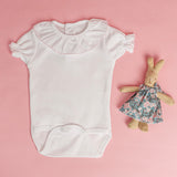 Body detalhe rosa m/curta