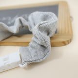 Prende chucha espinhado cinza